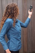 woman holding phone